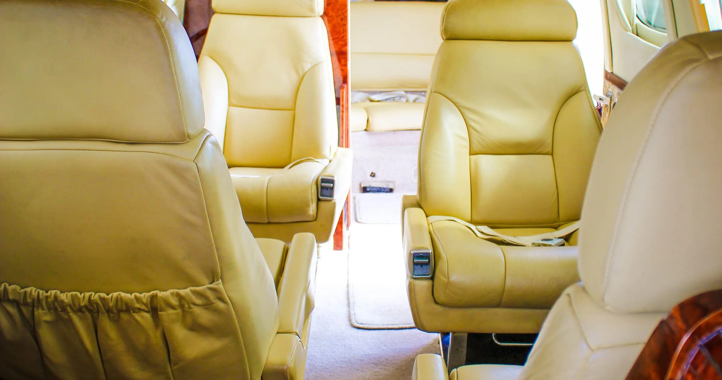 Leather club seating in the cabin of KW's Conquest II N441F
